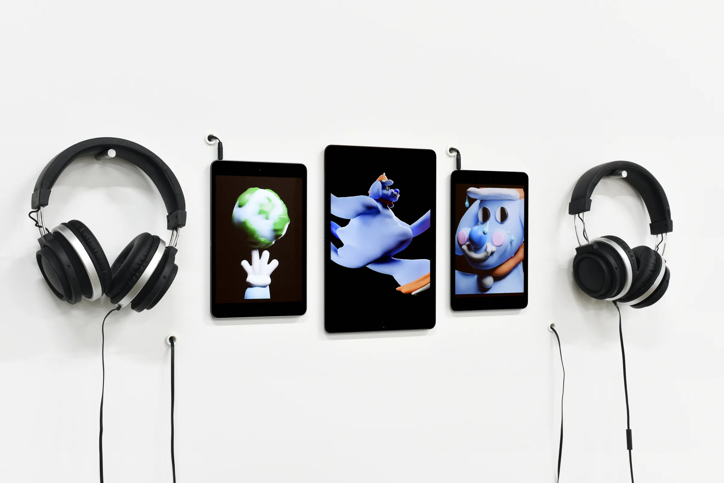 Sports Dreams animation and sound presented on three screens with headphones